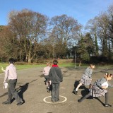 pupils outside with books