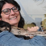 Staff holding snake - South African cricket tour