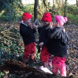 Applying face paint at Forest School