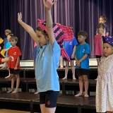 dancers at celebration assembly