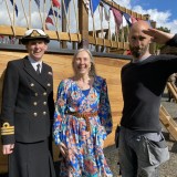 Fraser Mabitt-Mair built the ship stands with Caroline Oglethorpe and Cdr Becca Gorman