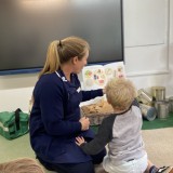 Nurse Chelcie visits the nursery children