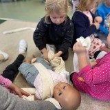 Nurse Chelcie visits the nursery children