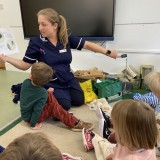 Nurse Chelcie visits the nursery children