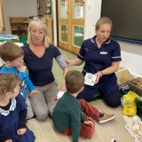 Nurse Chelcie visits the nursery children