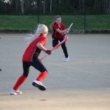 girls playing hockey