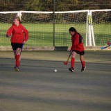 girls playing hockey