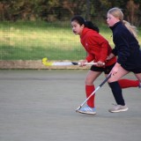 girls playing hockey