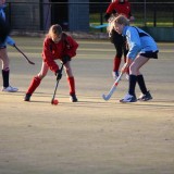 girls playing hockey