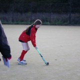 girls playing hockey