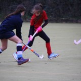 girls playing hockey