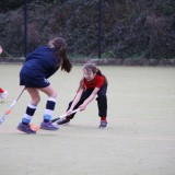 girls playing hockey