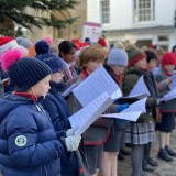 Chapel Choir singing at The Cross