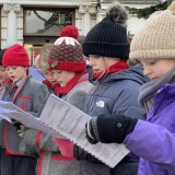 Chapel Choir singing at The Cross