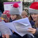 Chapel Choir singing at The Cross