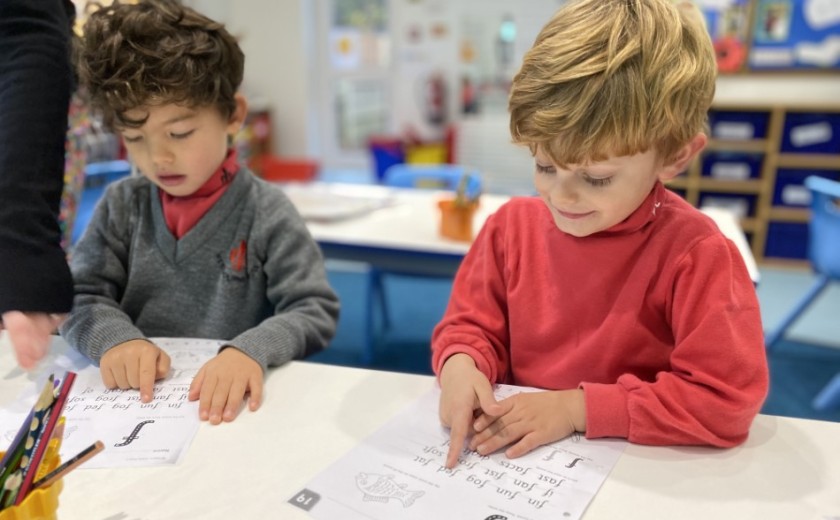 Children in Reception reading