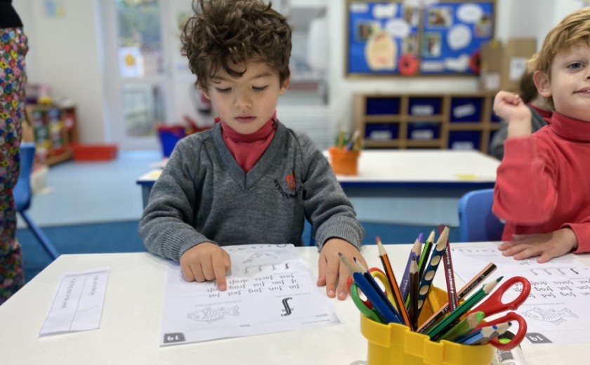 Children in Reception reading