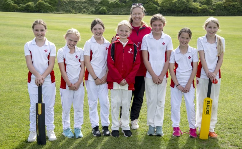 U10A girls cricket team with their coach Clare Smith