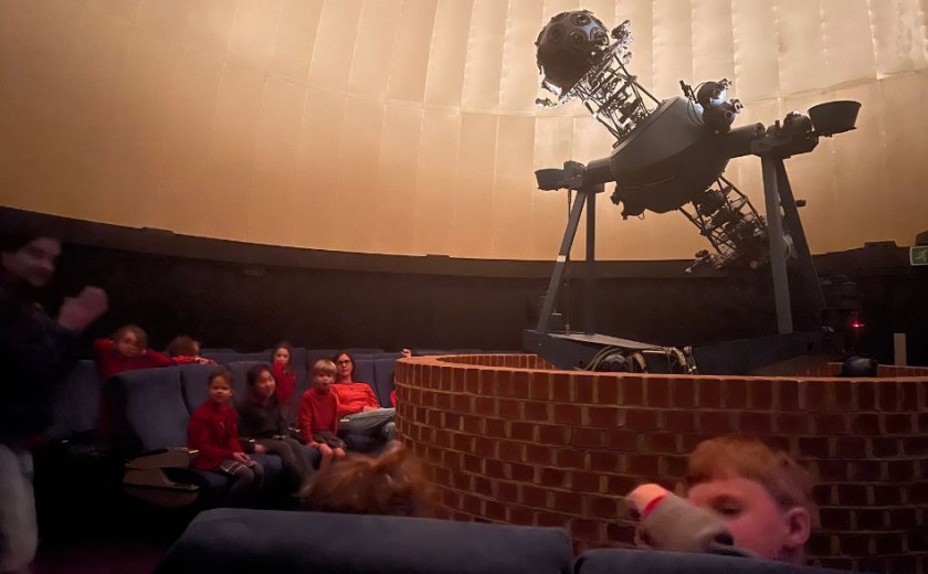 children in year 1 at planetarium