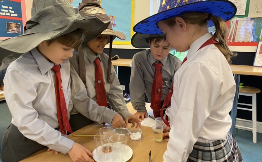 children doing science experiments in class