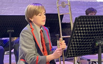 child at brass band workshop