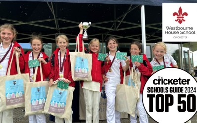 Westbourne House U10A girls cricket team won the Pelican Cup and show trophy