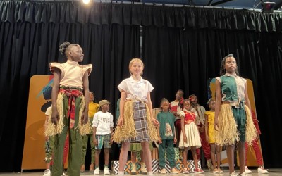 Watoto invited Westbourne House pupils up onto the stage